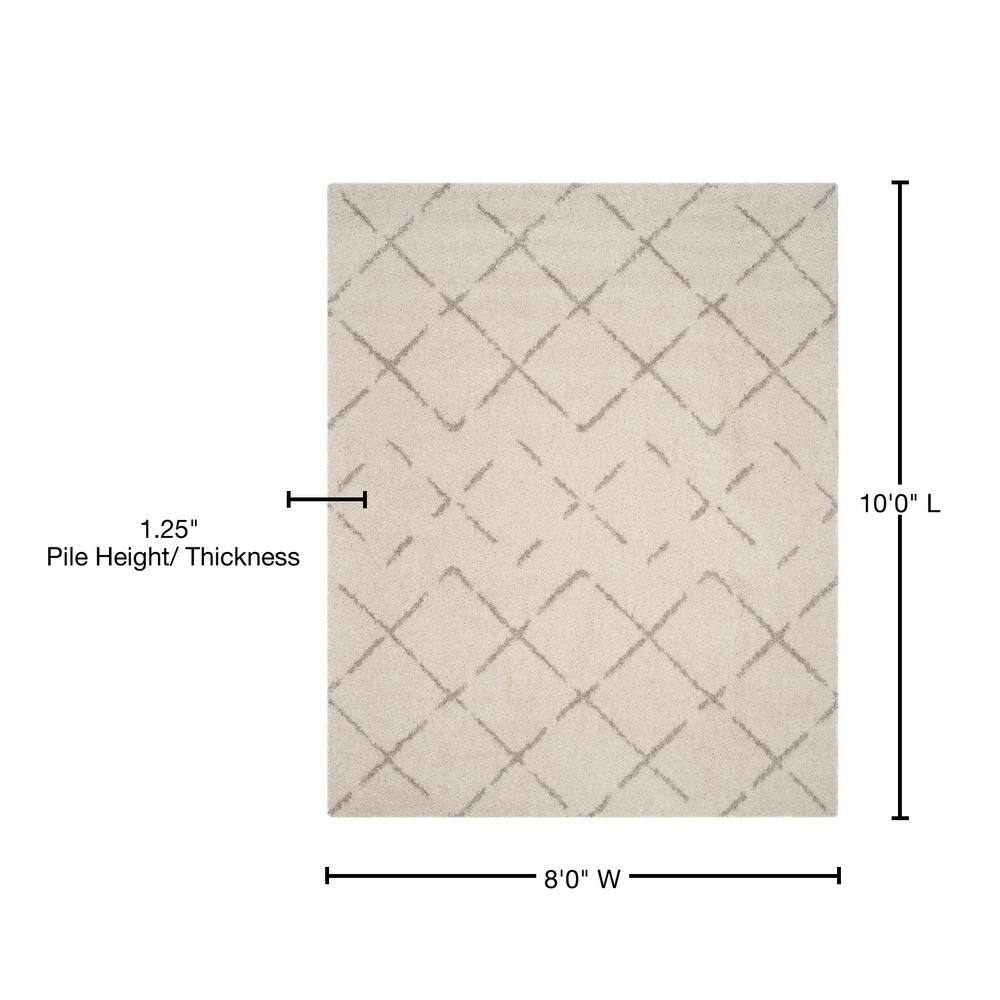 Ivory and Beige Geometric Shag 8' x 10' Area Rug