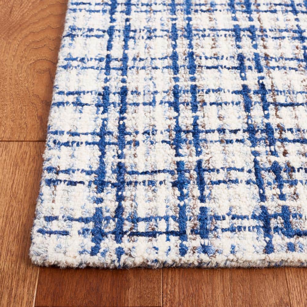 Blue and Ivory Abstract Wool 6' x 9' Handmade Area Rug