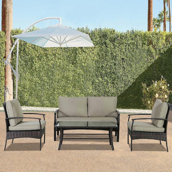 Zeus & Ruta Brown 4-Piece Wicker Metal Patio Conversation Set with Khaki Cushions and Coffee Table
