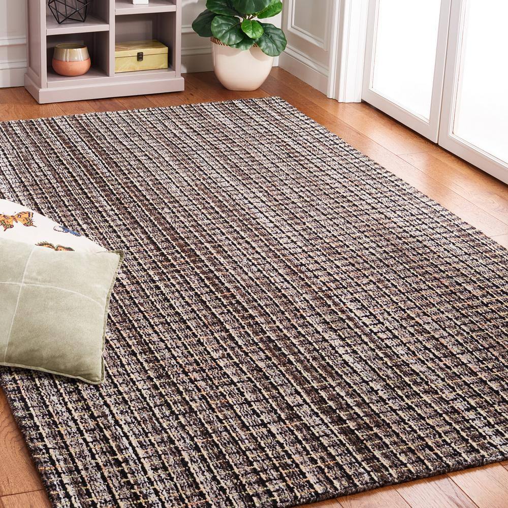 Black and Beige Abstract Handmade Wool 6' x 9' Tufted Rug