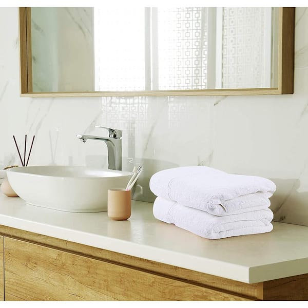 https://images.thdstatic.com/productImages/4e82e9d7-5cb0-4a82-b48d-a0132e180e6e/svn/white-bath-towels-400-fa_600.jpg