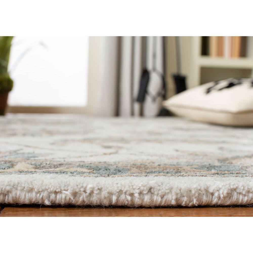 Handmade Ivory Floral Tufted Wool Round Rug, 5' x 5'