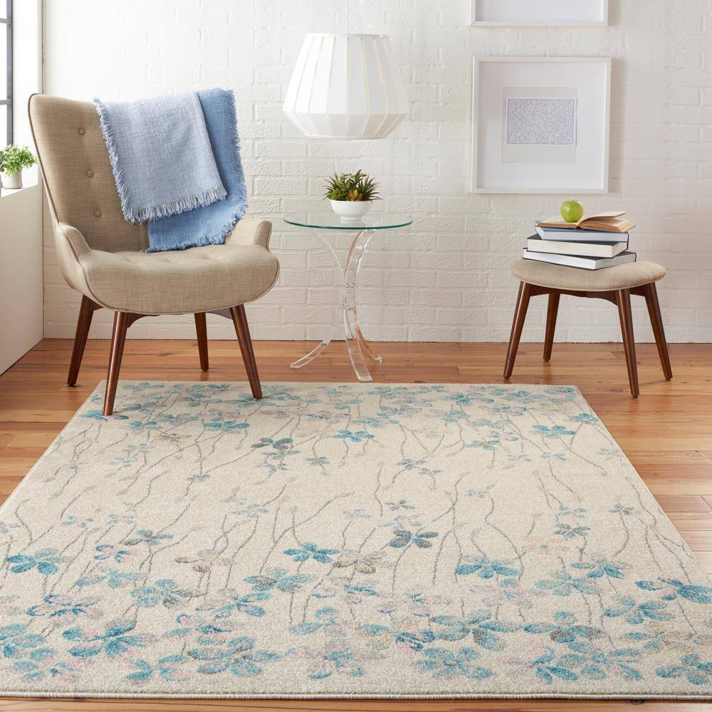 Ivory Floral Bliss Synthetic 5'3" x 7'3" Round Area Rug