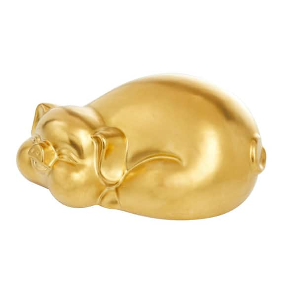 Premium Photo  A gold pig shaped pig with a gold head.