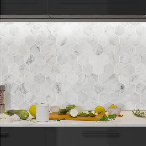 Carrara White Hexagon 12 in. x 12 in. x 8mm Honed Marble Mesh Mounted Mosaic Tile (9.8 sq. ft./ case) Carrara White Hexagon 12 in. x 12 in. x 8mm Honed Marble Mesh Mounted Mosaic Tile (9.8 sq. ft./ case)