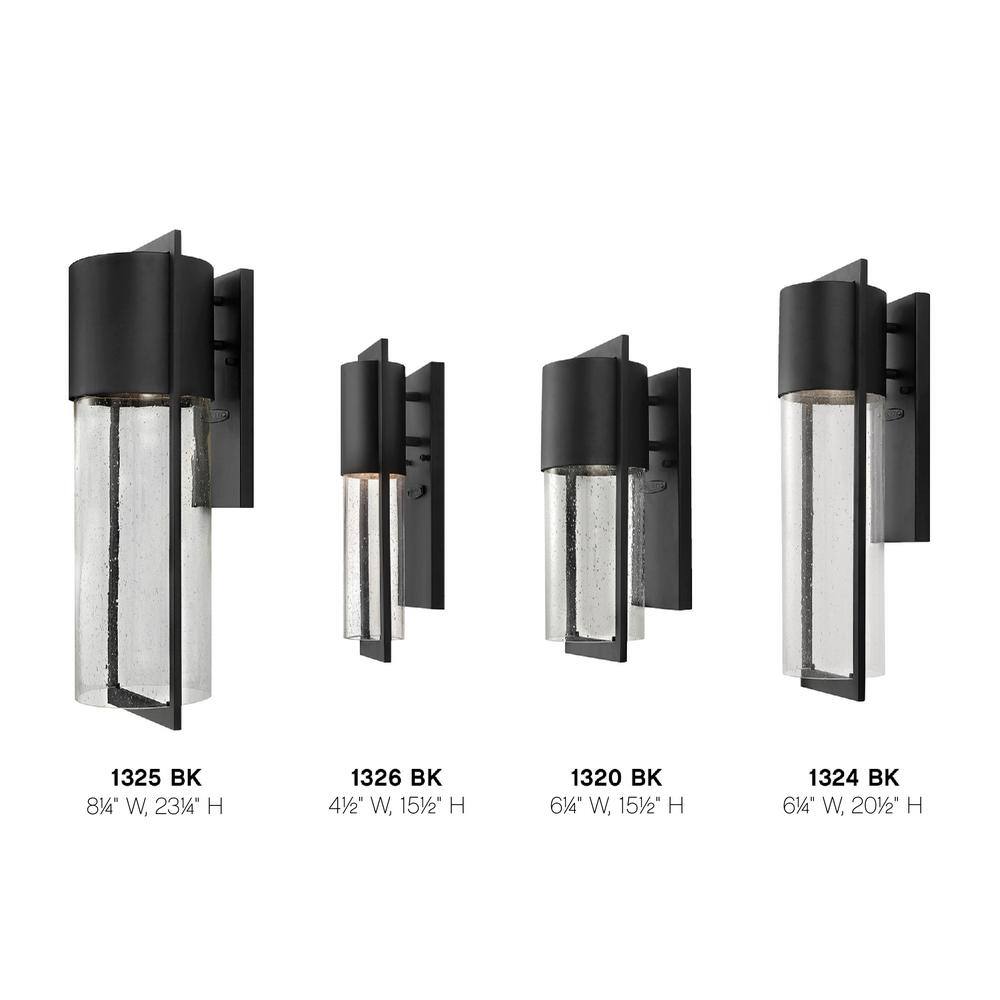 Sleek Black Outdoor Wall Sconce with Clear Seedy Glass