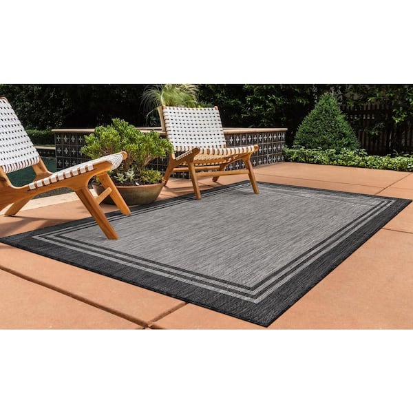 https://images.thdstatic.com/productImages/4f1d04a6-f125-44b7-a7f5-3d343ed2b305/svn/silver-pebble-outdoor-rugs-hd-alh60262-10x14-44_600.jpg