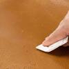Close-up texture of whiskey brown faux leather material.