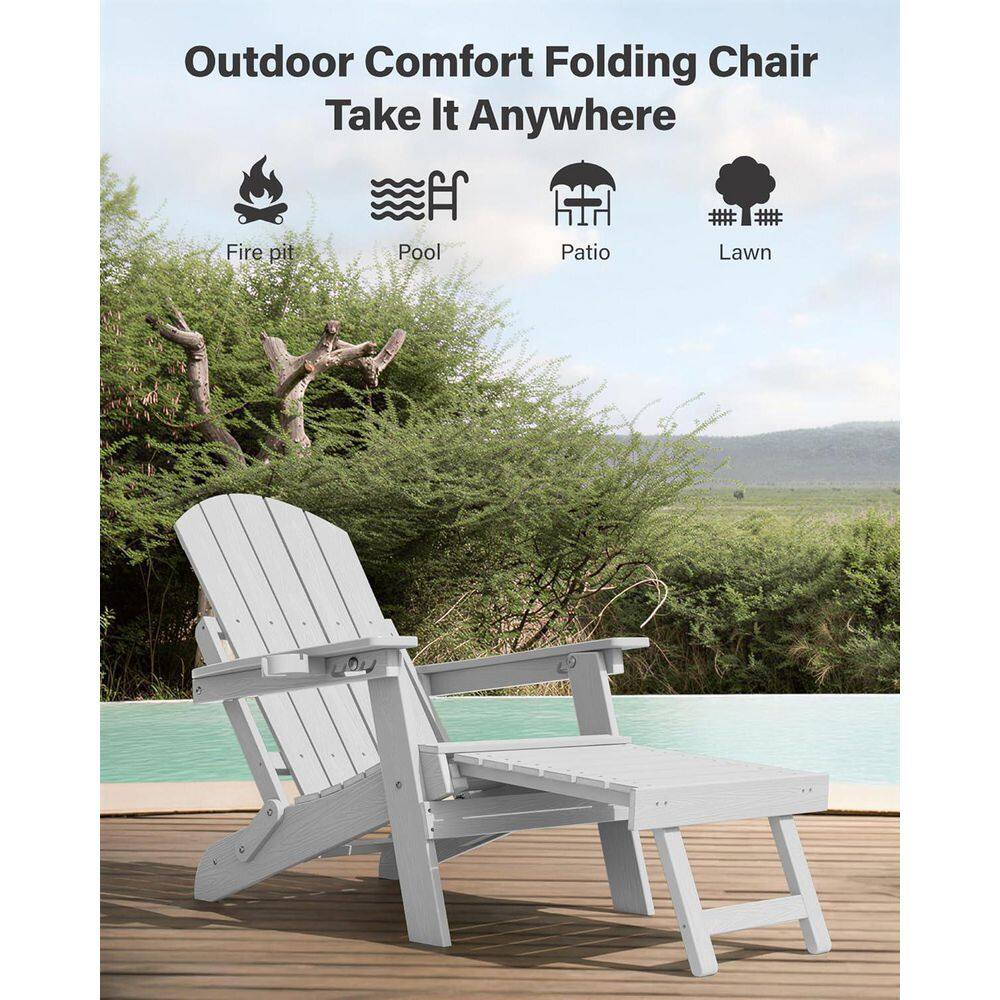 White Adirondack chair with ottoman by a pool.