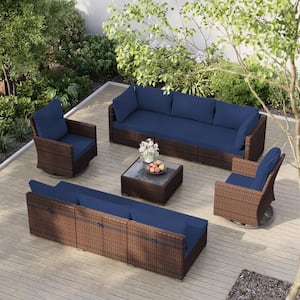 9-Piece Wicker Patio Conversation Set with Swivel Chairs Coffee Table and Navy Blue Cushions