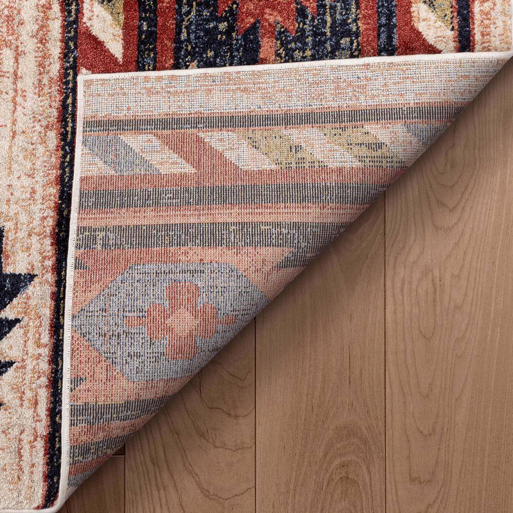Cream and Multicolor 4' x 6' Southwestern Synthetic Area Rug