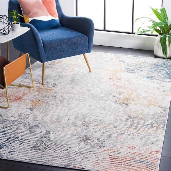 Vogue 8 ft. x 10 ft. Ivory/Blue Rust Distressed Abstract Striped Area Rug