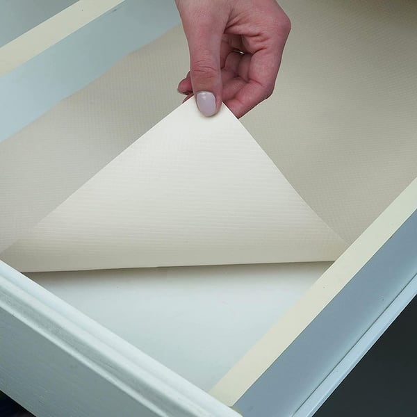 https://images.thdstatic.com/productImages/4f893de5-7d62-4eba-abc9-06e0775aaff9/svn/almond-con-tact-shelf-liners-drawer-liners-05f-c5t12-06-c3_600.jpg