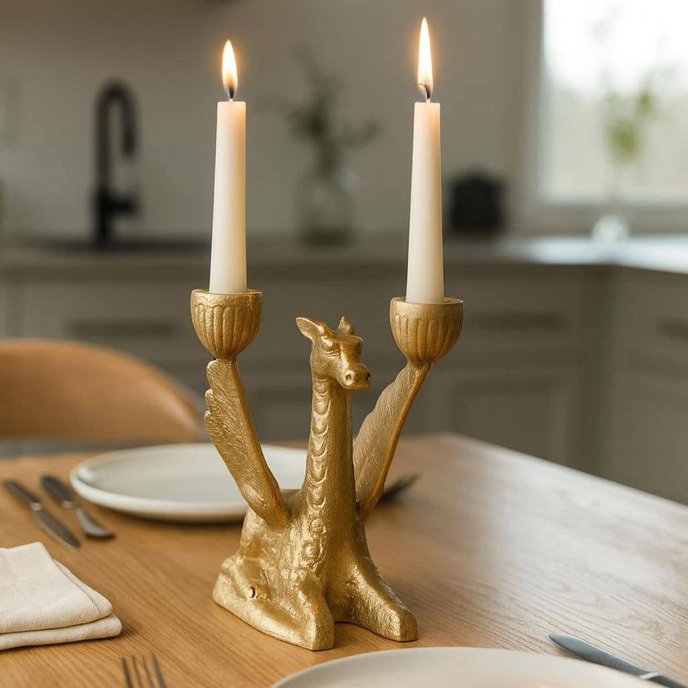 Liv & Skye Gold 6 in. Metal Novelty Giraffe with Wings 2 Taper