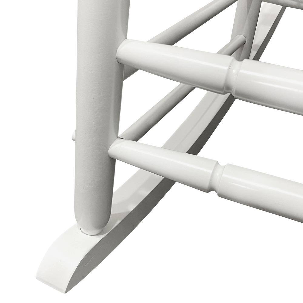 Close-up of the leg and rocker of a white wooden chair