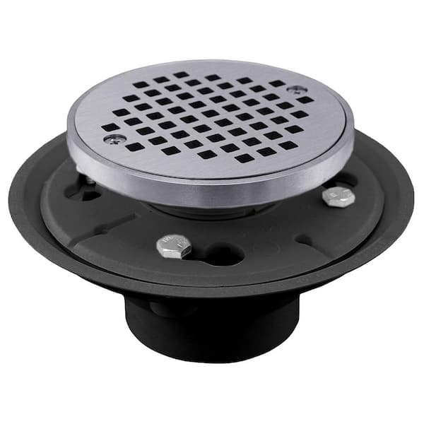 JONES STEPHENS 2 in. x 3 in. PVC Shower Drain/Floor Drain with 4 in. Chrome Plated Cast Round Strainer Ring-Fits Over 2 in. Sch 40 Pipe