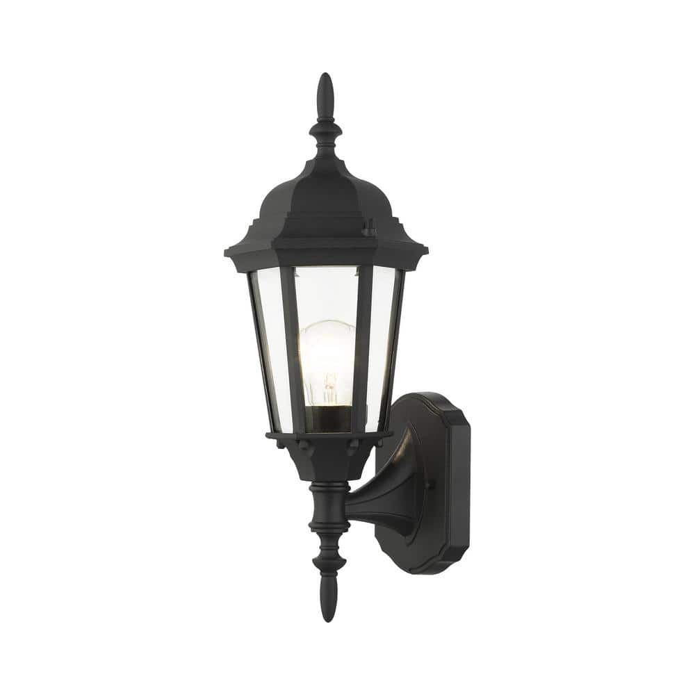 https://images.thdstatic.com/productImages/4fdfb77a-c947-4a3f-8356-776a0adf4094/svn/textured-black-livex-lighting-outdoor-sconces-7551-14-64_1000.jpg