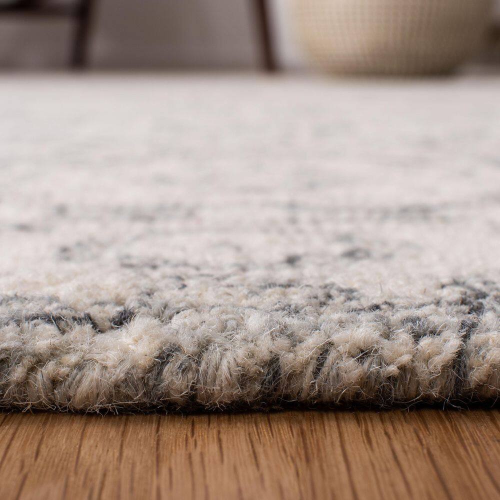 Ivory Elegance 10' x 14' Handmade Wool Tufted Rug