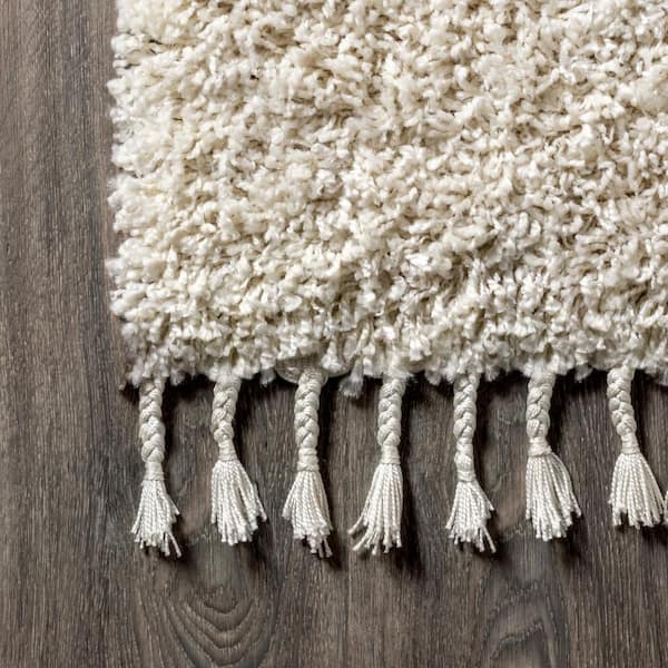 JONATHAN Y Mercer Shag Plush Tassel Cream 8 ft. x 10 ft. Area Rug