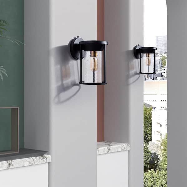 Hawaii 11.02 in. H Black Seeded Glass Hardwired Outdoor Wall Lantern Sconce with Dusk to Dawn (Set of 2)