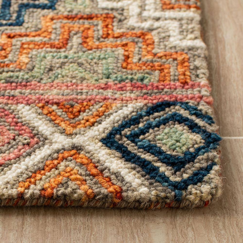 Handmade Blue and Orange Geometric Wool Area Rug