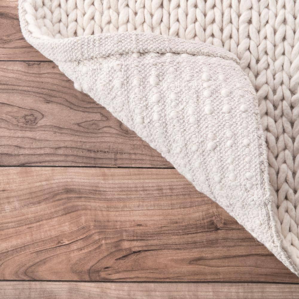 Off-White Braided Wool 6' x 9' Area Rug