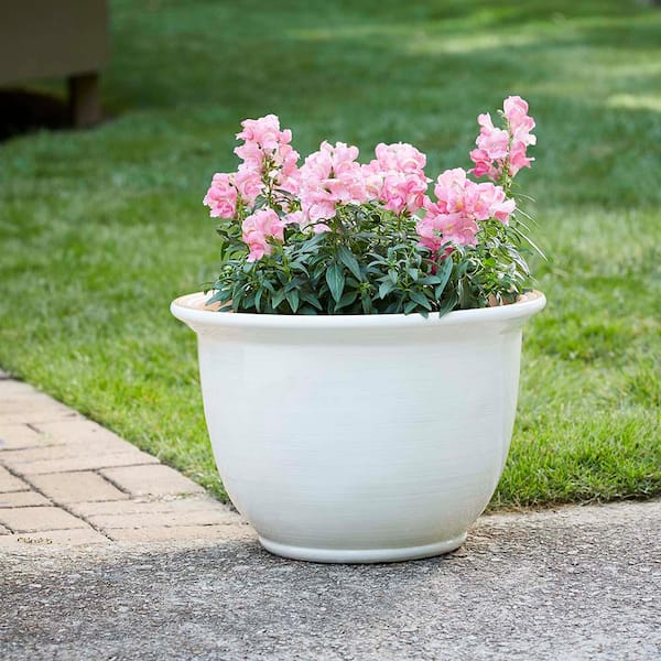 https://images.thdstatic.com/productImages/5047da57-55ad-4142-b988-ee49988dad4a/svn/chalk-southern-patio-plant-pots-cmx-057710-1f_600.jpg