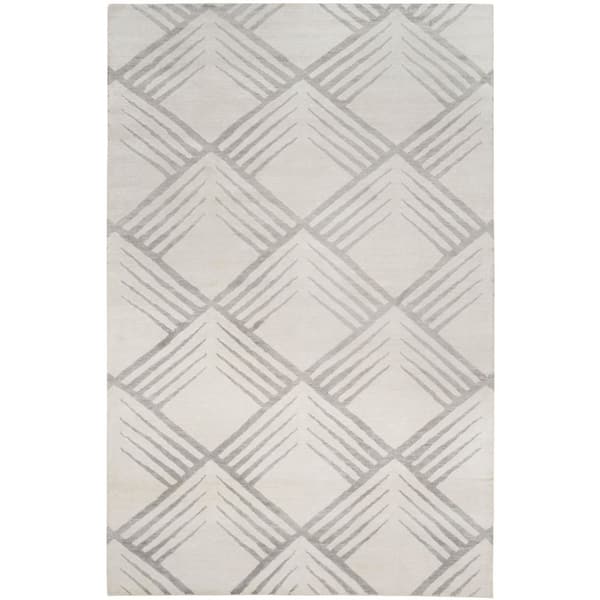 Tibetan 6 X 9 Ivory/Silver Geometric Area Rug