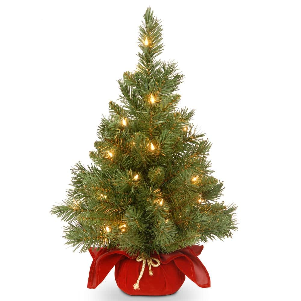 https://images.thdstatic.com/productImages/504df7b3-7d40-4256-b5be-649c9bedf7ee/svn/national-tree-company-christmas-tabletop-trees-mj3-24bglo-1-64_1000.jpg