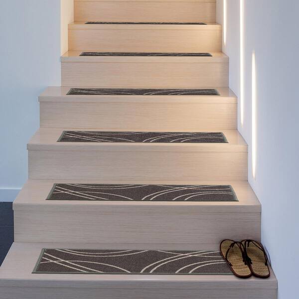 https://images.thdstatic.com/productImages/5069b40d-af60-48db-9d1a-2be83ca10eae/svn/gray-4-set-world-rug-gallery-stair-tread-covers-70130gray4pk-31_600.jpg