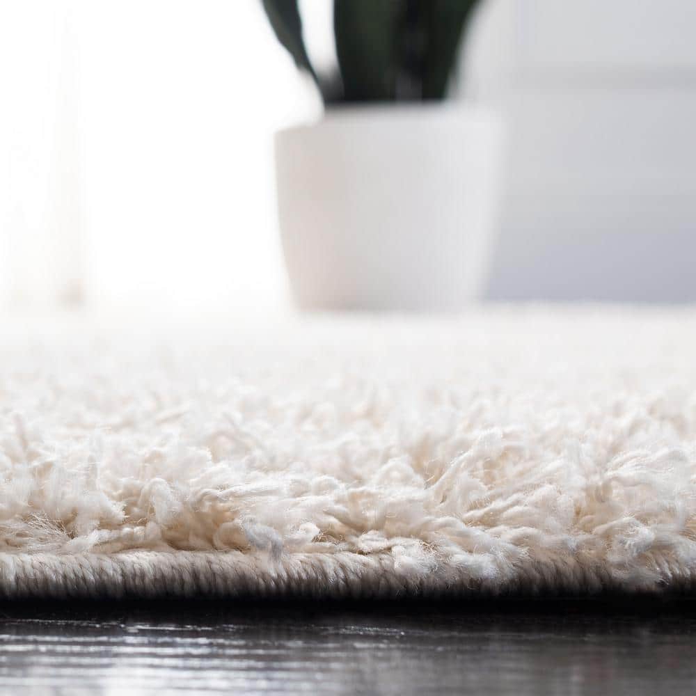 Elysian Ivory 9' x 12' Hand-Knotted Shag Area Rug