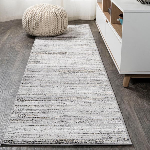 https://images.thdstatic.com/productImages/5072e6d2-b223-42f1-a1c5-f3ec08f6176b/svn/gray-black-jonathan-y-area-rugs-sor200a-28-64_600.jpg