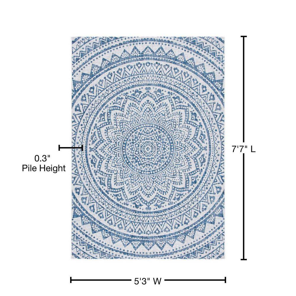 Ivory and Navy Geometric Round Synthetic Area Rug