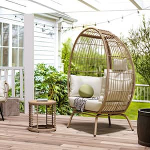 Brown Wicker Egg Chair with Outdoor Side Table and Beige Cushion