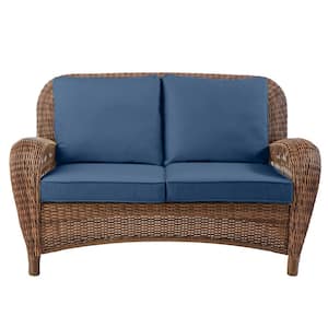 Hampton bay cambridge brown wicker outdoor patio shop loveseat with standard midnight navy blue cushions