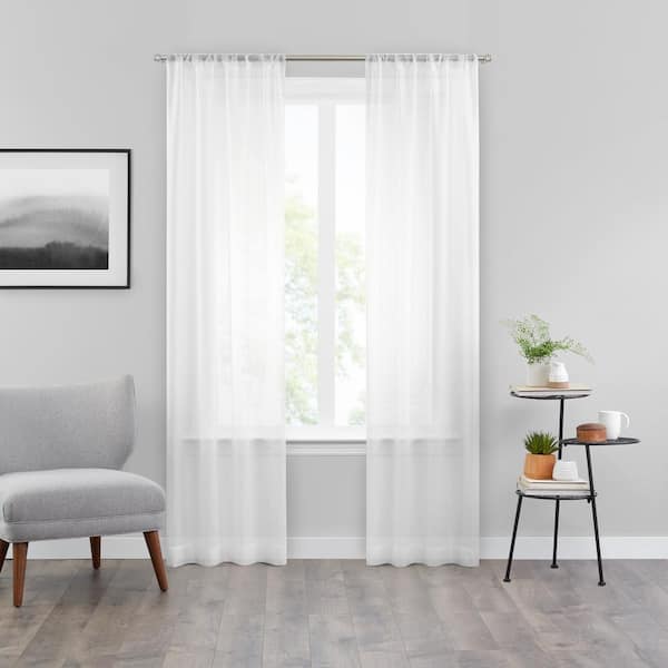 Vue Snow Sheer  White Textured Solid Polyester 37 in. W x 63 in. L Sheer Single Rod Pocket Curtain Panel