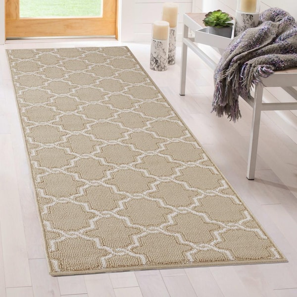 https://images.thdstatic.com/productImages/5087b5cd-26f3-4cb2-b9e8-7edcf20309b5/svn/beige-and-white-jean-pierre-area-rugs-yma016691-1f_600.jpg
