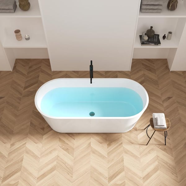 WELLFOR 67 in. x 30 in. Freestanding Soaking Bathtub in Glossy White with Brushed Nickel Center Drain