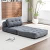 Dark gray corduroy bean bag chair laid out flat on the floor.