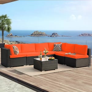 7-Piece Wicker Outdoor Sectional Set with Red Cushions and Coffee Table