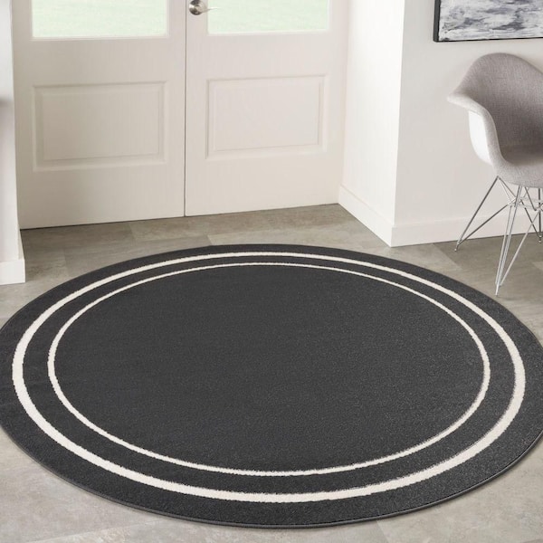 Nourison Essentials Black Ivory 4 ft. x 4 ft. Solid Contemporary Round Area Rug