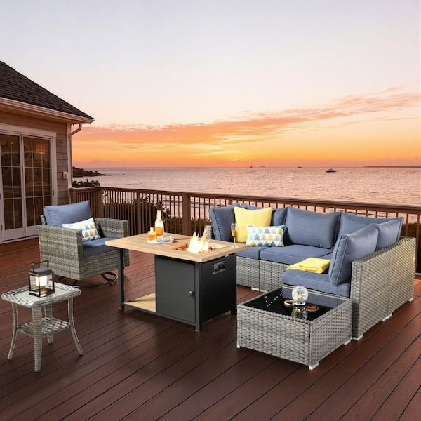 Sanibel Gray 8-Piece Wicker Patio Conversation Sofa Set with a Swivel Chair, a Storage Fire Pit and Denim Blue Cushions
