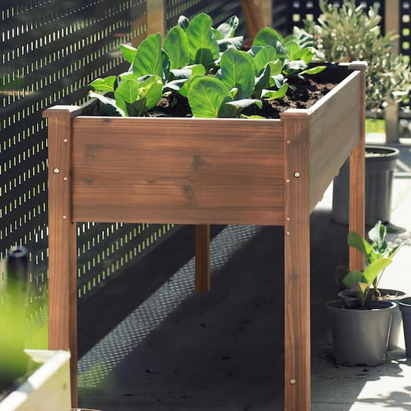 https://images.thdstatic.com/productImages/50fa7132-abe9-4a3a-b9c2-3a2abbddf326/svn/carbonized-veikous-raised-planter-boxes-pg0102-01rt-1-76_600.jpg