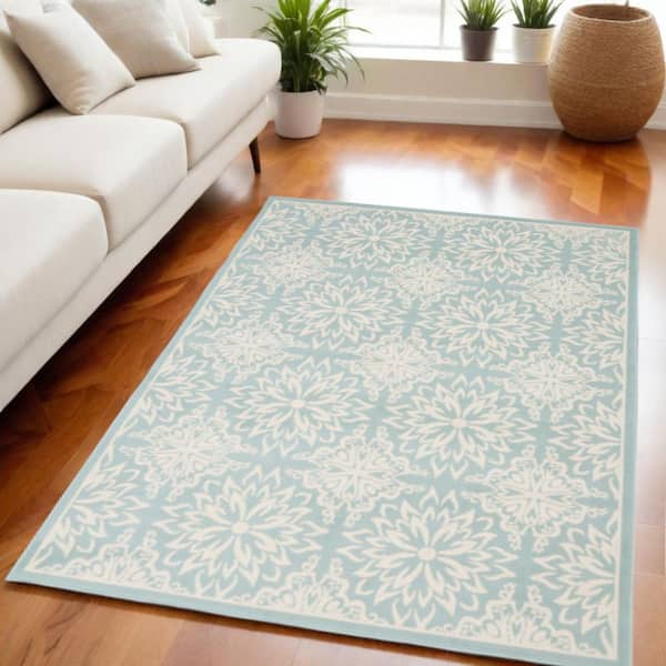 5' X 7' Blue and Ivory Floral Medallion Power Loom Area Rug