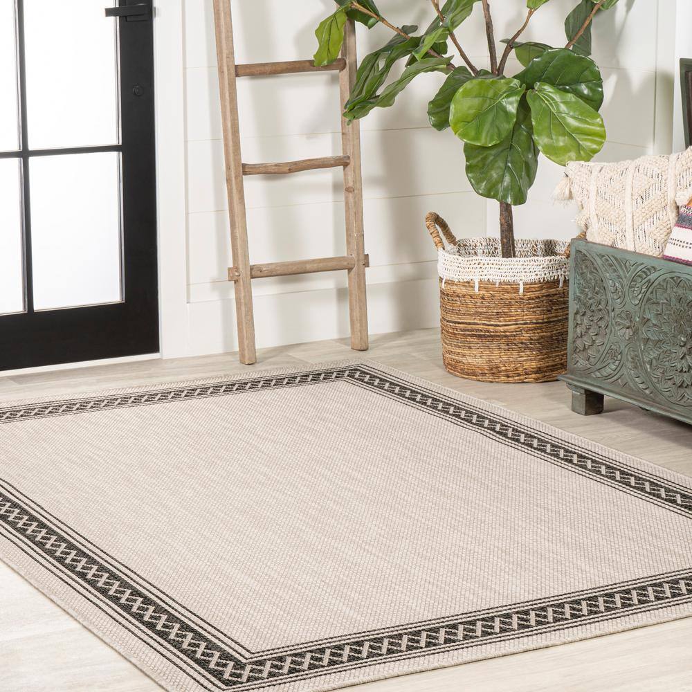 Reversible Cream and Black Diamond Geometric Synthetic Area Rug