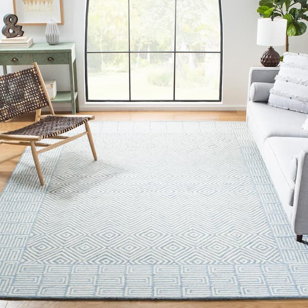 Roslyn Light Blue/Ivory 8 ft. x 10 ft. Border Chevron Area Rug