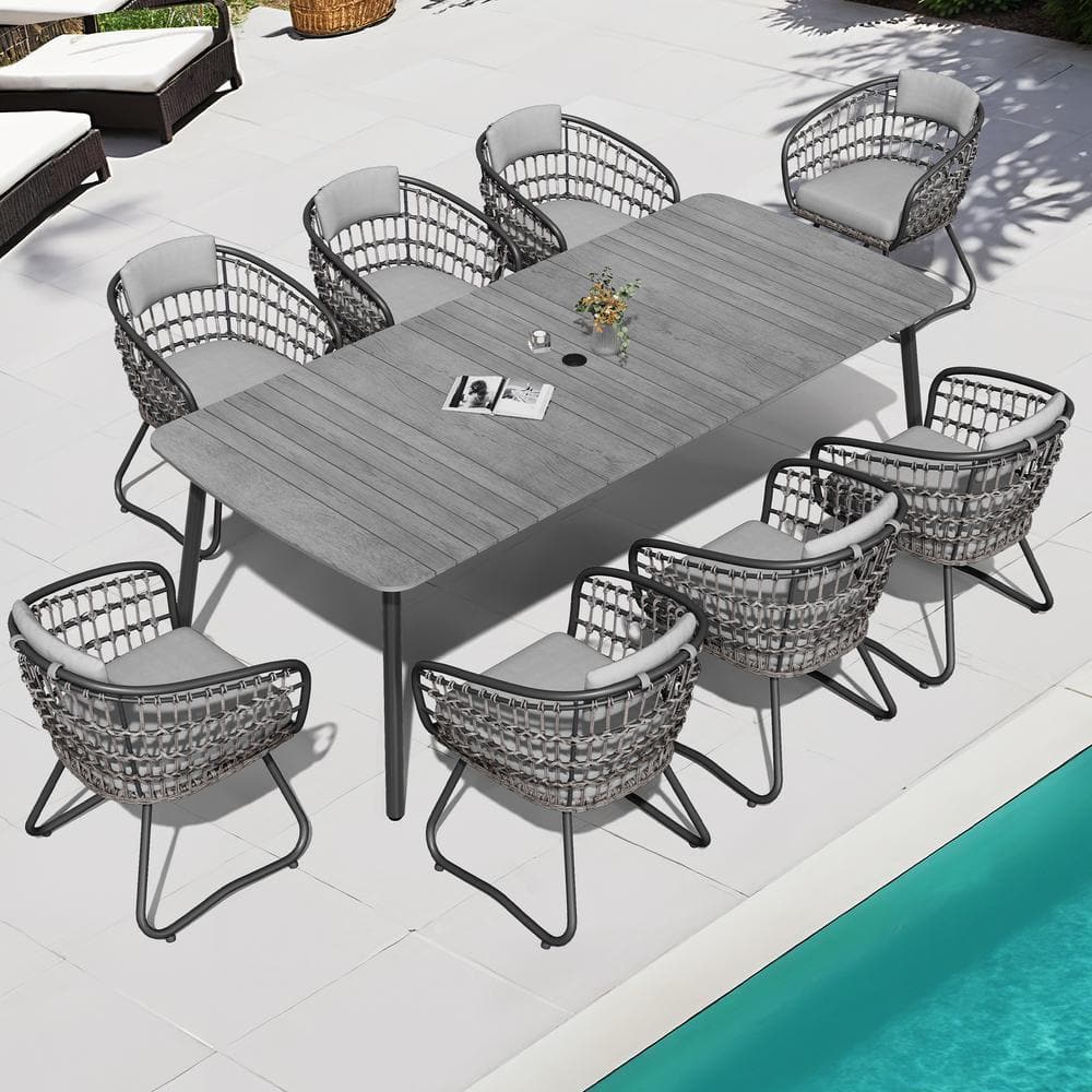 9-Piece Faux Rattan Wicker Chairs Aluminum Rectangular Table Outdoor Dining Set with Gray Cushion