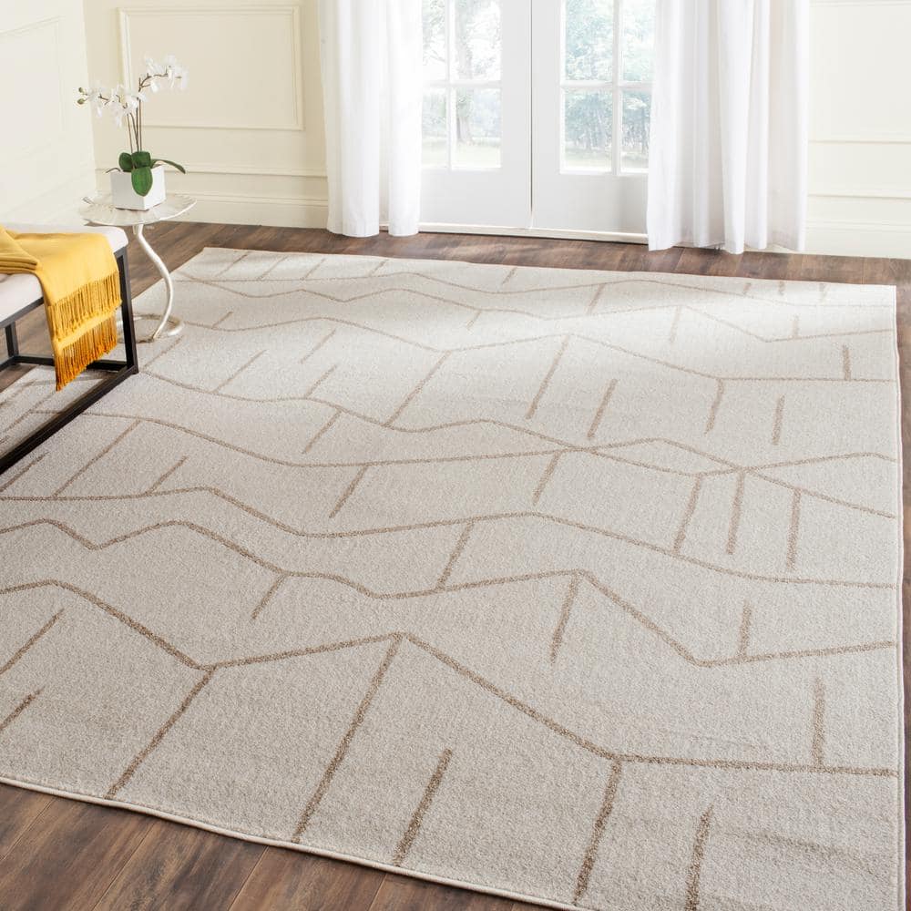 Ivory Geometric Easy-Care 8' x 10' Synthetic Area Rug