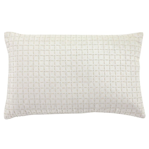 white decorative lumbar pillow