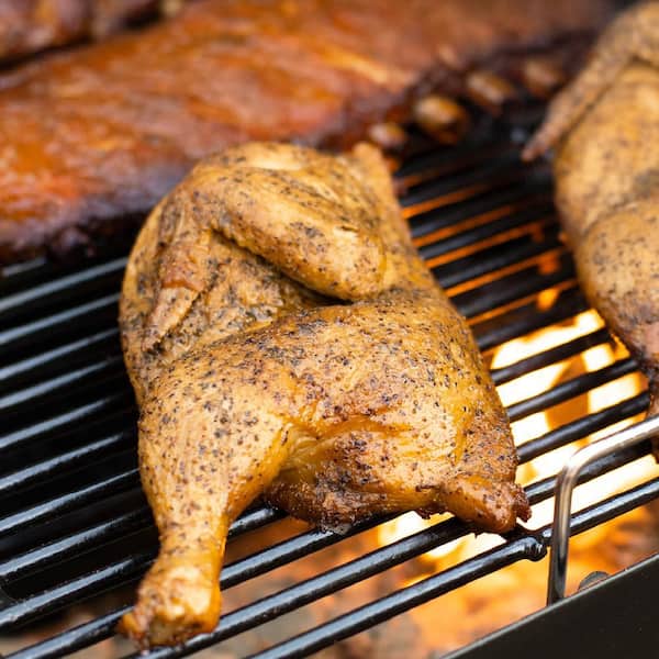 Dual Threat 2-Burner Gas and Charcoal Grill with Adjustable Fire Grate, Side Fire Box, and Electric Ignition - Black